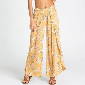 Size small yellow and floral, flowy, Billabong pants!